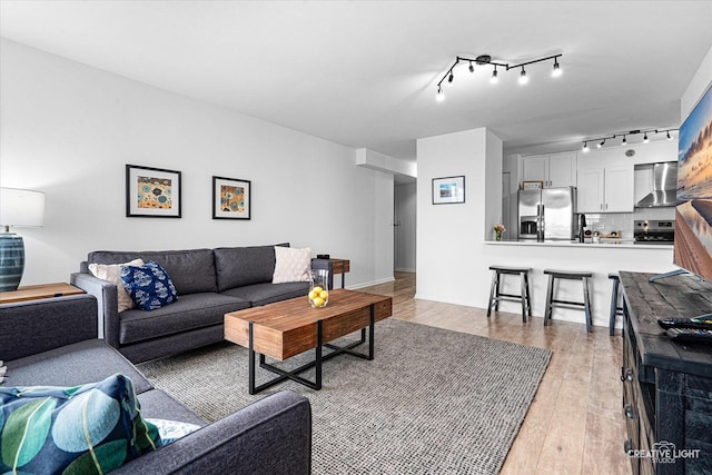 345 N La Salle Dr Unit 3507, Chicago, IL 60654 - living room with light wood-style flooring and track lighting