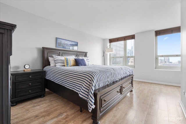 345 N La Salle Dr Unit 3507, Chicago, IL 60654 - bedroom with light wood-type flooring and baseboards
