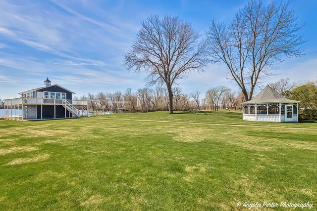 41653 N Lotus Ave, Antioch, IL 60002 - view of green lawn with a gazebo, stairs, and a wooden deck