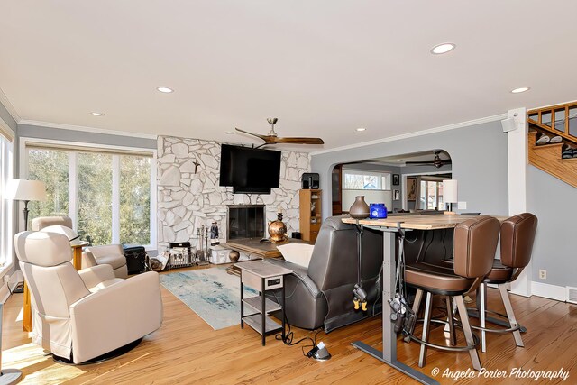 41653 N Lotus Ave, Antioch, IL 60002 - living area with a ceiling fan, ornamental molding, wood finished floors, a fireplace, and healthy amount of natural light