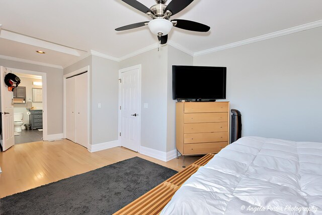 41653 N Lotus Ave, Antioch, IL 60002 - bedroom with light wood finished floors, crown molding, a closet, connected bathroom, and a ceiling fan