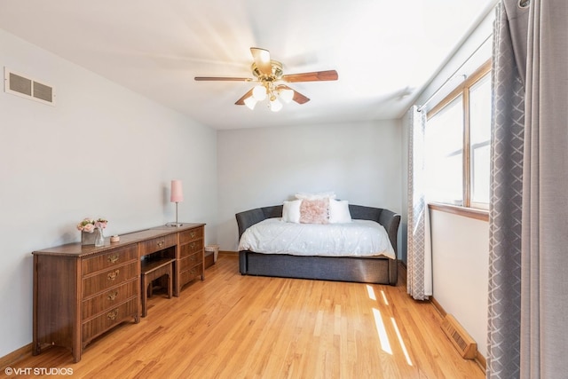 1014 Douglas Ave, Flossmoor, IL 60422 - bedroom featuring light wood-style floors, a ceiling fan, and baseboards