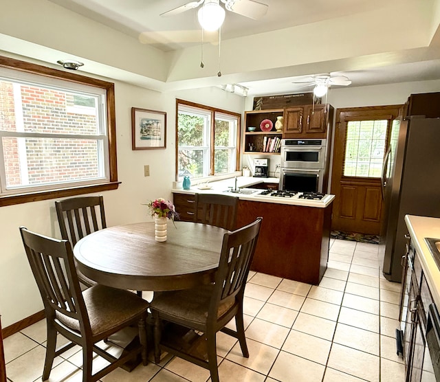 1014 Douglas Ave, Flossmoor, IL 60422 - living room featuring wood finished floors, a ceiling fan, a stone fireplace, and baseboards