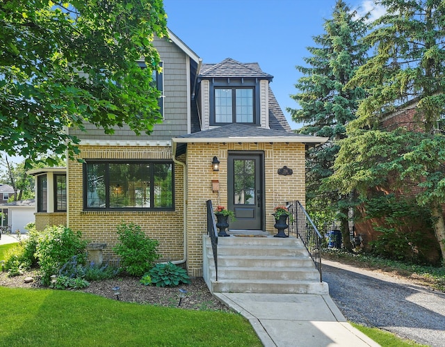 734 Forest Rd, La Grange Park, IL 60526 - view of front of house with brick siding and roof with shingles