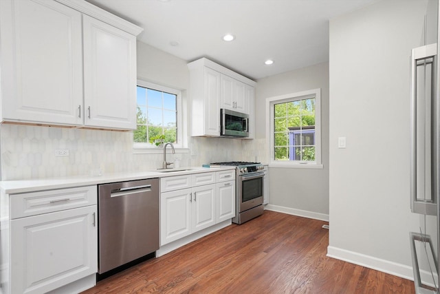 734 Forest Rd, La Grange Park, IL 60526 - kitchen featuring stainless steel appliances, a sink, decorative backsplash, healthy amount of natural light, and recessed lighting