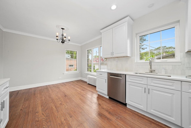 734 Forest Rd, La Grange Park, IL 60526 - kitchen featuring dishwasher, a chandelier, a sink, plenty of natural light, and ornamental molding