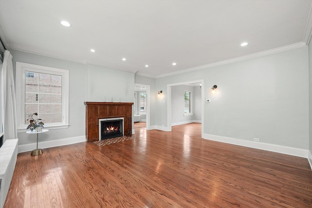 734 Forest Rd, La Grange Park, IL 60526 - unfurnished living room with a fireplace with flush hearth, wood finished floors, baseboards, crown molding, and recessed lighting