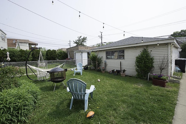4033 N Austin Ave, Chicago, IL 60634 - view of yard with a fire pit