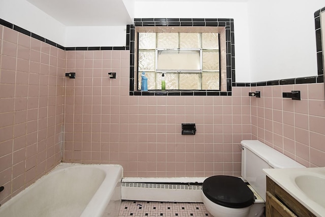 4033 N Austin Ave, Chicago, IL 60634 - full bath with a baseboard radiator, tile walls, toilet, and vanity