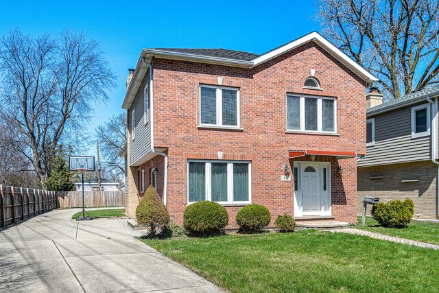 48 Hackberry Ln, Glenview, IL 60025 - view of front facade featuring brick siding and concrete driveway