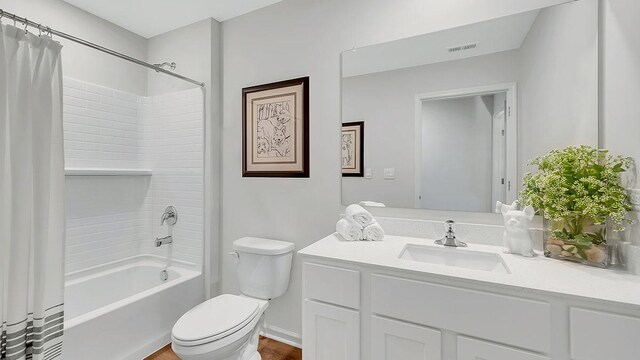 13603 S Carmel Blvd, Plainfield, IL 60544 - bathroom with vanity, toilet, shower / bathtub combination with curtain, and wood finished floors