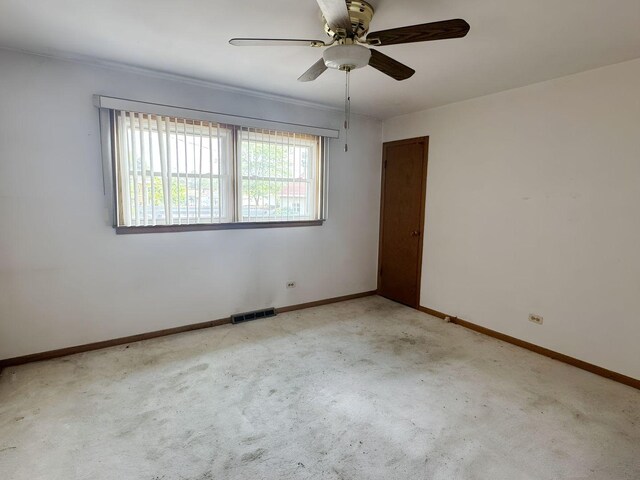 5349 N Meade Ave, Chicago, IL 60630 - unfurnished room featuring wood finished floors, a ceiling fan, and baseboards