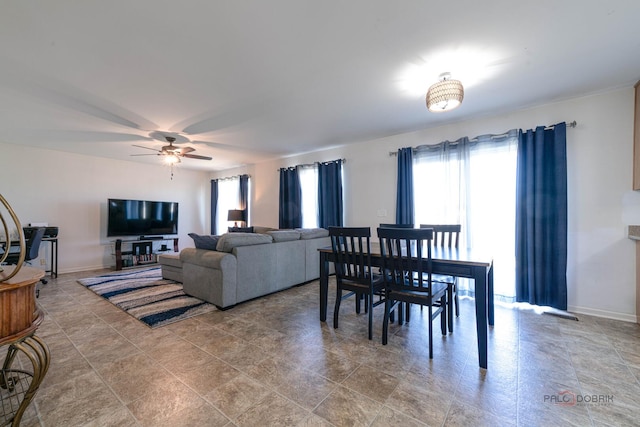 39862 Waterloo Dr, Beach Park, IL 60083 - dining area featuring a ceiling fan and baseboards