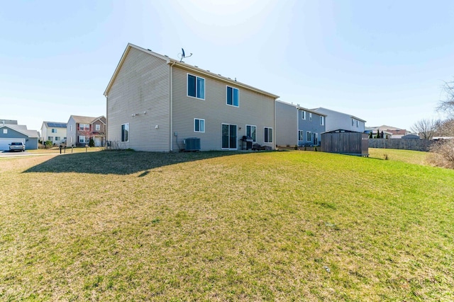 39862 Waterloo Dr, Beach Park, IL 60083 - back of house with a lawn, a residential view, and cooling unit