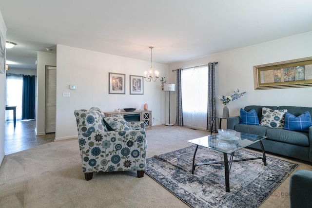 39862 Waterloo Dr, Beach Park, IL 60083 - living room with light carpet, a chandelier, and baseboards