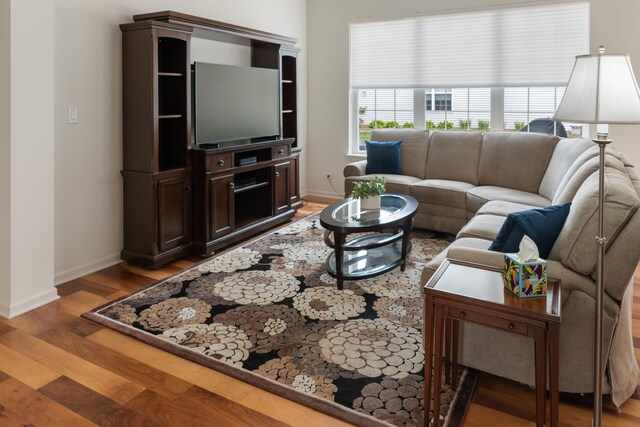 552 Autumn Cir, Pingree Grove, IL 60140 - living area featuring light wood-style floors and baseboards