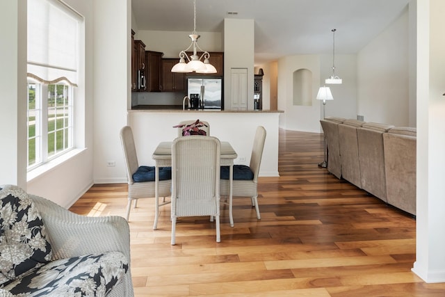 552 Autumn Cir, Pingree Grove, IL 60140 - dining area with light wood-type flooring and baseboards