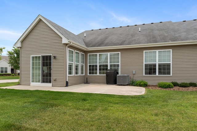 552 Autumn Cir, Pingree Grove, IL 60140 - rear view of house featuring a patio area, a lawn, central air condition unit, and a shingled roof