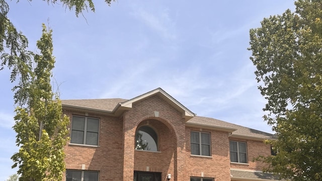 805 S Chatham Ave, Addison, IL 60101 - view of front of home featuring brick siding and a shingled roof