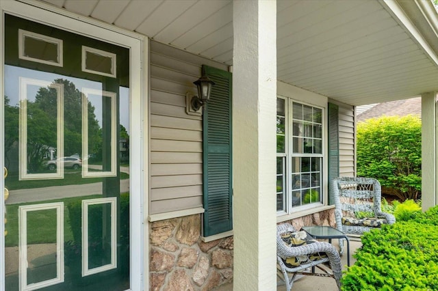 642 Dunham Rd, Gurnee, IL 60031 - doorway to property with covered porch and stone siding