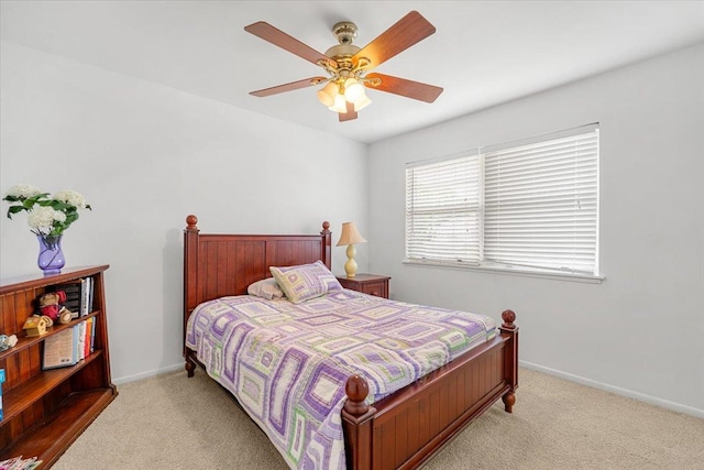 642 Dunham Rd, Gurnee, IL 60031 - bedroom with light carpet, ceiling fan, and baseboards