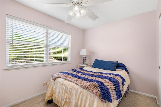642 Dunham Rd, Gurnee, IL 60031 - bedroom featuring carpet, multiple windows, baseboards, and ceiling fan