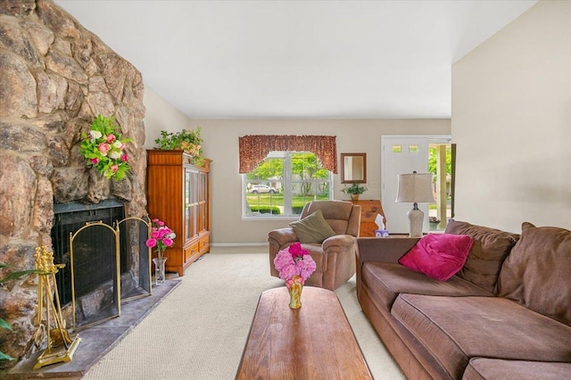 642 Dunham Rd, Gurnee, IL 60031 - living room with carpet flooring, plenty of natural light, baseboards, a fireplace, and lofted ceiling