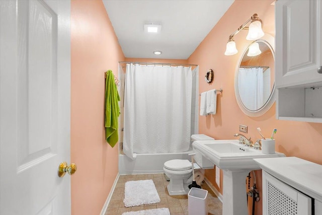 642 Dunham Rd, Gurnee, IL 60031 - bathroom with toilet, baseboards, shower / bath combination with curtain, and tile patterned floors