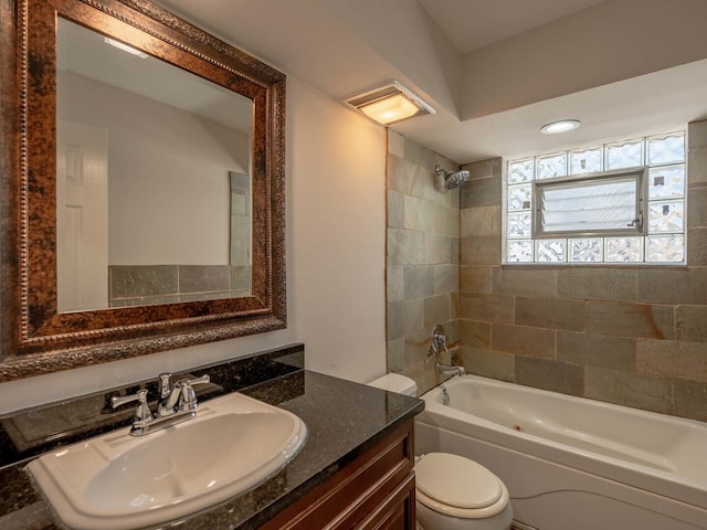 2207 N 74th Ct Unit 2, Elmwood Park, IL 60707 - bathroom featuring toilet, washtub / shower combination, and vanity