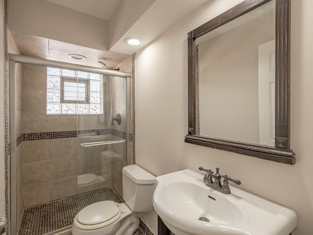 2207 N 74th Ct Unit 2, Elmwood Park, IL 60707 - full bathroom featuring toilet, a shower stall, and a sink