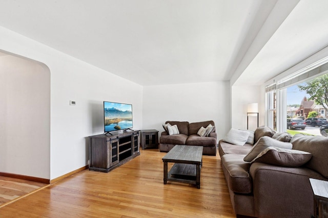 5423 S Rutherford Ave, Chicago, IL 60638 - living room with light wood-type flooring and arched walkways