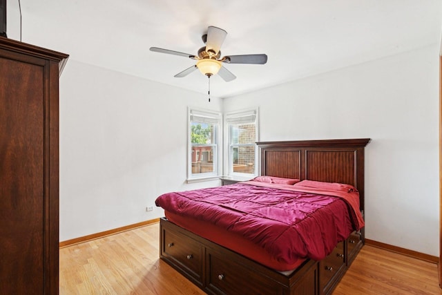 5423 S Rutherford Ave, Chicago, IL 60638 - bedroom featuring light wood-style floors and a ceiling fan