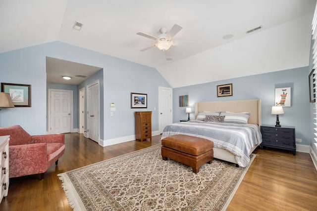 3329 N Bell Ave, Chicago, IL 60618 - bedroom featuring vaulted ceiling, dark wood-style flooring, and a ceiling fan