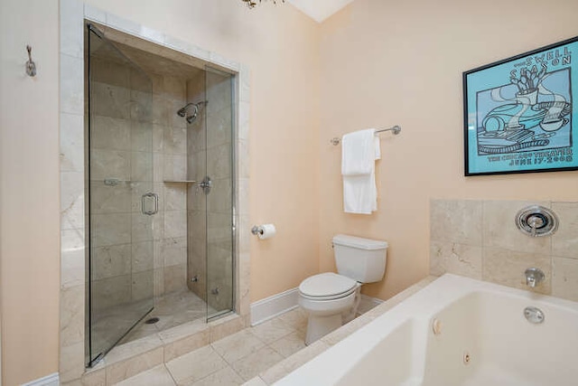 3329 N Bell Ave, Chicago, IL 60618 - bathroom with a tub with jets, a shower stall, and tile patterned floors