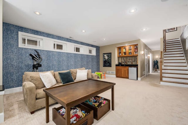 3329 N Bell Ave, Chicago, IL 60618 - living room with wallpapered walls, a dry bar, stairs, and recessed lighting