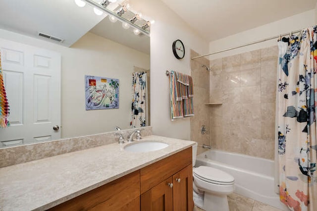 3329 N Bell Ave, Chicago, IL 60618 - bathroom featuring vanity, shower / tub combo, and tile patterned flooring