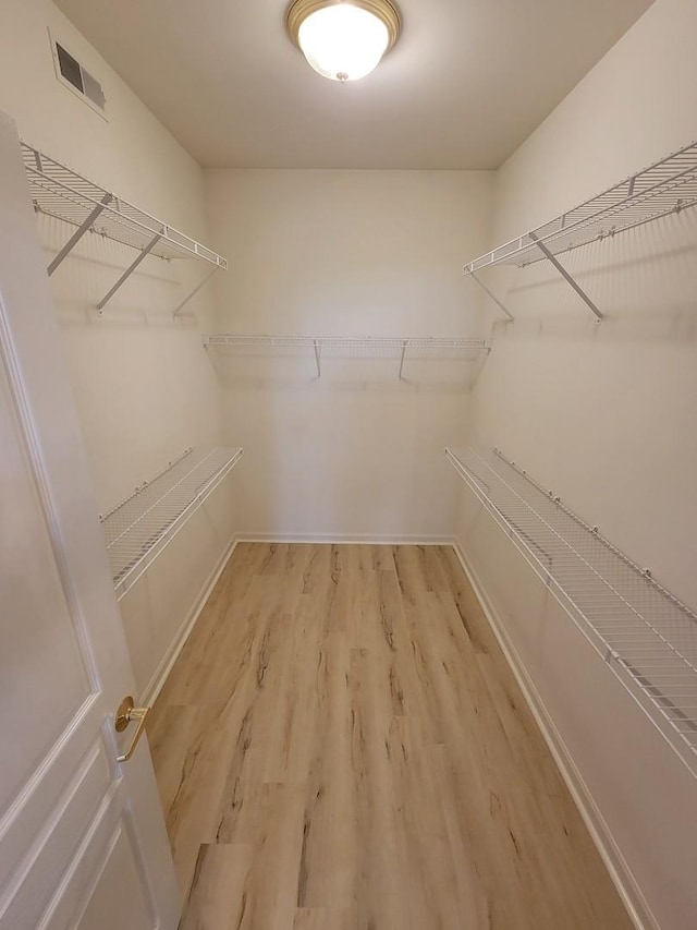 13663 Whittingham Ln, Huntley, IL 60142 - walk in closet featuring light wood-type flooring