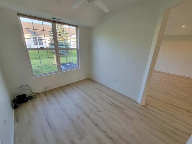 13663 Whittingham Ln, Huntley, IL 60142 - spare room with plenty of natural light, light wood-type flooring, a ceiling fan, and baseboards