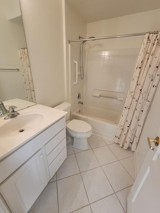 13663 Whittingham Ln, Huntley, IL 60142 - full bath featuring shower / bath combo with shower curtain, tile patterned flooring, vanity, and toilet