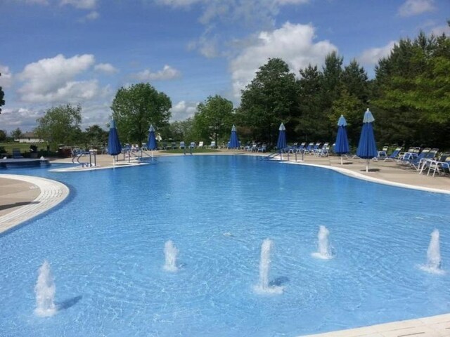 13663 Whittingham Ln, Huntley, IL 60142 - community pool with a patio area