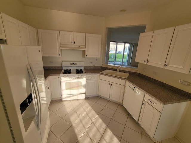 13663 Whittingham Ln, Huntley, IL 60142 - kitchen featuring white appliances, a sink, dark countertops, and white cabinetry