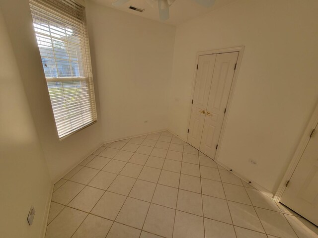 13663 Whittingham Ln, Huntley, IL 60142 - unfurnished room featuring light tile patterned flooring and ceiling fan