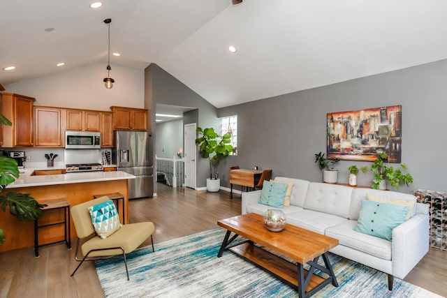 2737 W Thomas St Unit 3, Chicago, IL 60622 - living area featuring light wood-type flooring, high vaulted ceiling, and recessed lighting