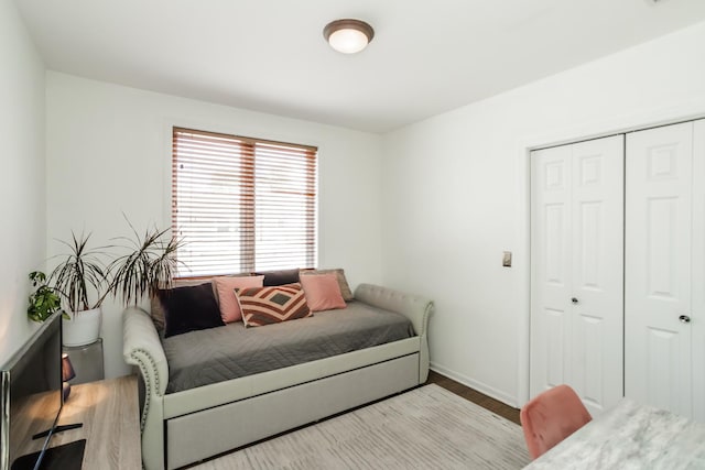 2737 W Thomas St Unit 3, Chicago, IL 60622 - bedroom featuring a closet, wood finished floors, and baseboards