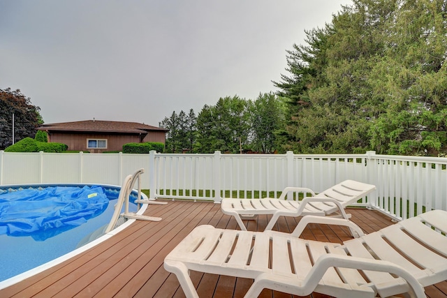 611 Marsha Ln, Rock Falls, IL 61071 - wooden deck featuring view of wooded area