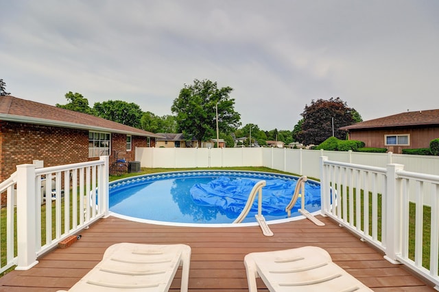 611 Marsha Ln, Rock Falls, IL 61071 - view of pool with a wooden deck and a fenced backyard