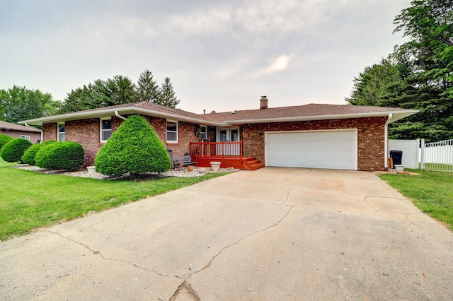 611 Marsha Ln, Rock Falls, IL 61071 - single story home featuring an attached garage, a chimney, brick siding, and driveway