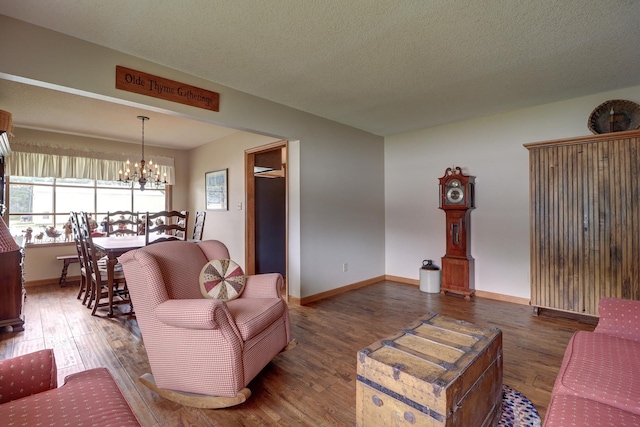 611 Marsha Ln, Rock Falls, IL 61071 - living room with wood finished floors, a chandelier, and baseboards