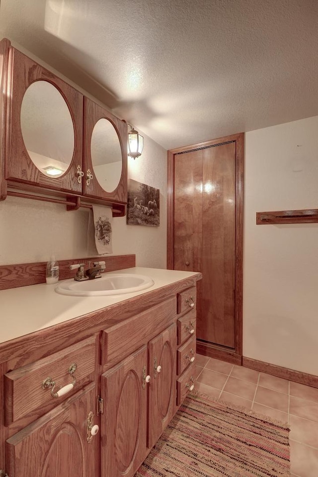 611 Marsha Ln, Rock Falls, IL 61071 - bathroom featuring vanity, a textured ceiling, and tile patterned floors