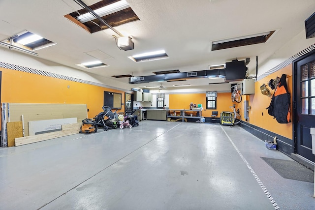 7308 W Lancaster Rd, Peoria, IL 61607 - garage with a garage door opener